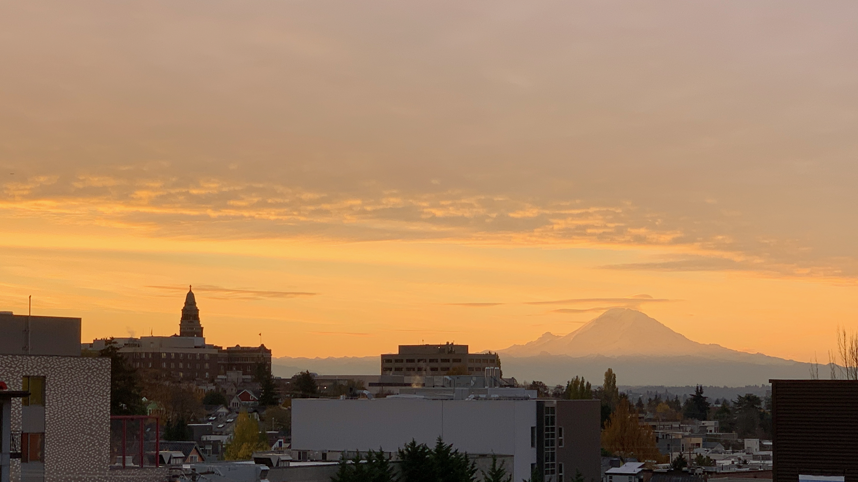 sunrise in Seattle, looking out to Mount Rainier in the distance